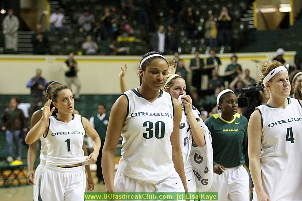 Senior Taylor Lilley waves in acknowledgment of fans ovation.