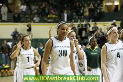 Senior Taylor Lilley waves in acknowledgment of fans ovation.