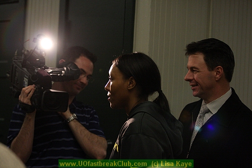 Honorary Captain, Shaquala Williams, is interviewed by TV news at half-time.